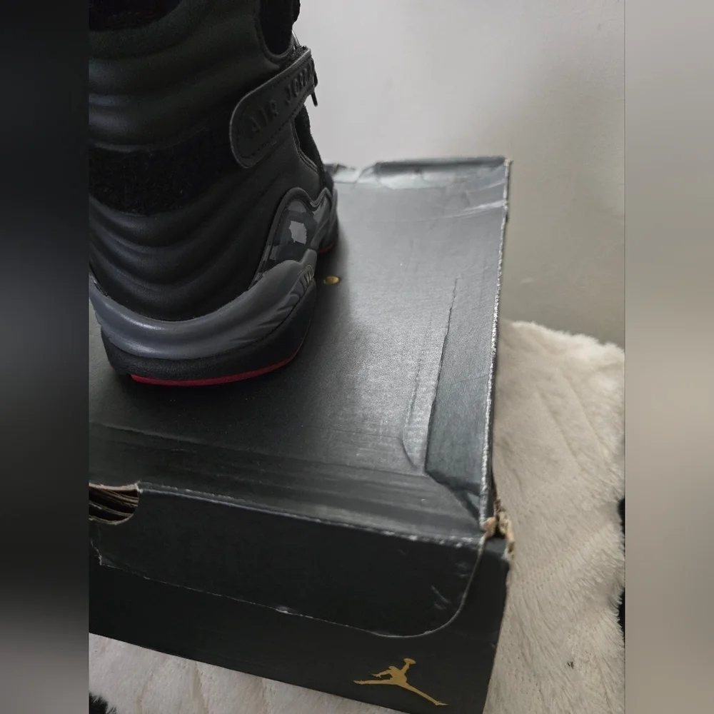 Jordan Black and Gray Sneakers with Cross-Straps...